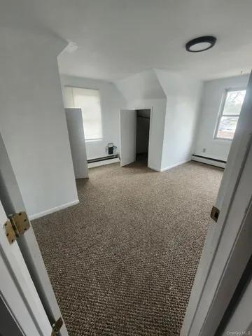 a view of a livingroom with a staircase
