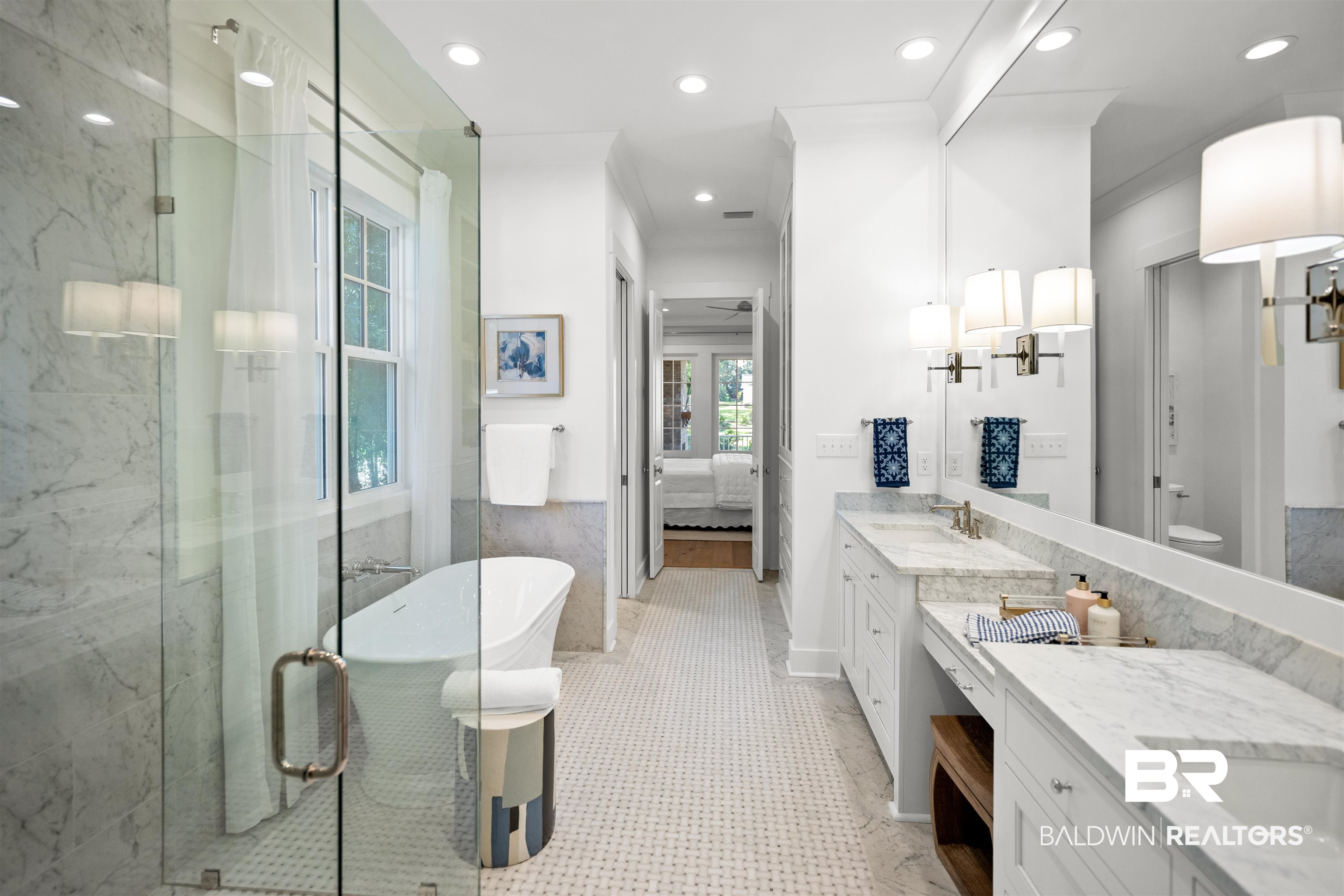 156 Hyacinth Street Fairhope, AL 36532 - Photo 40 of 61 Ensuite bathroom with two vanities, recessed lighting, a freestanding bath, a marble finish shower, and a ceiling fan