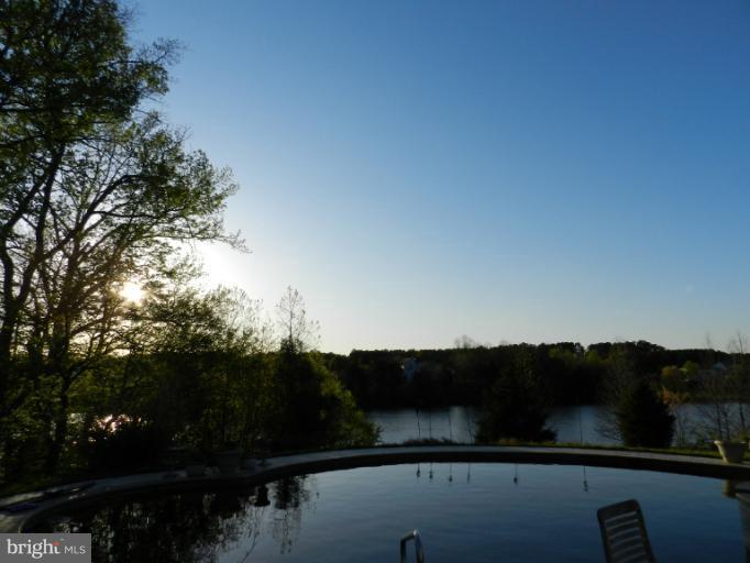 38 Winning Colors Road Stafford, VA 22556 - Photo 11 of 13 Sun sets in West over Lake and Pool.