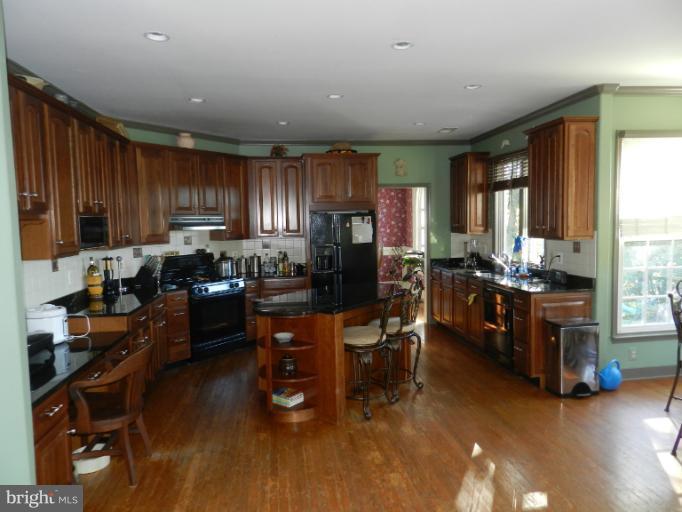 38 Winning Colors Road Stafford, VA 22556 - Photo 3 of 13 Kitchen with Granite and Hardwood.