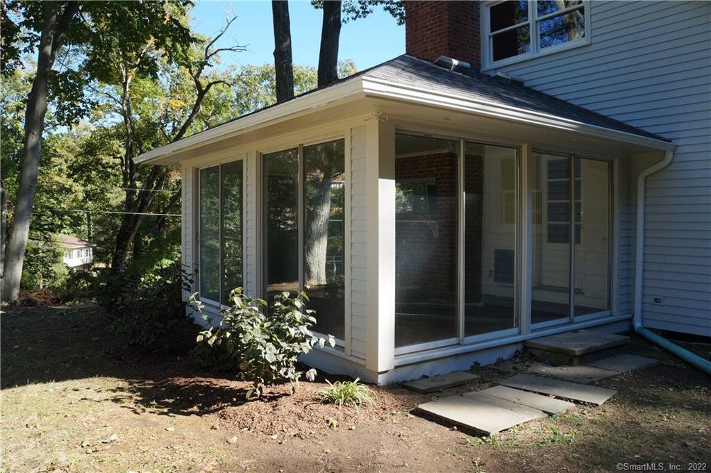 569 Belden Hill Road Norwalk, CT 06850 - Photo 3 of 21 Heated Sunroom overlooking Private Yard.