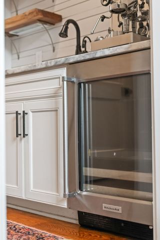a spacious bathroom with a granite countertop sink mirror and double