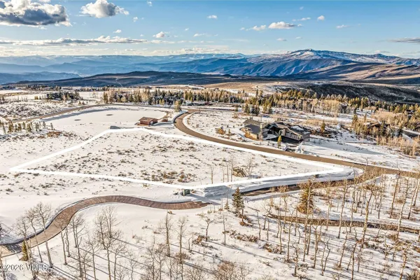 a view of a backyard of a house