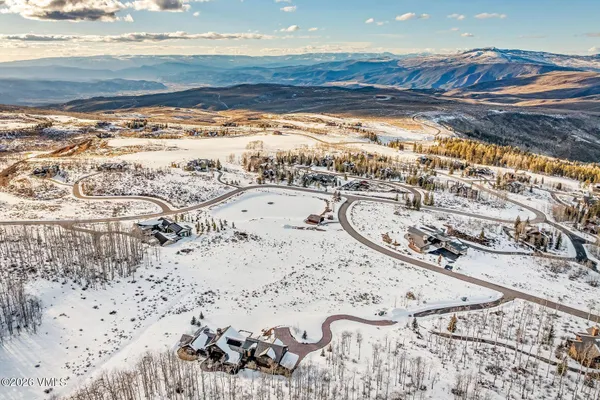 a view of a swimming pool and an outdoor space