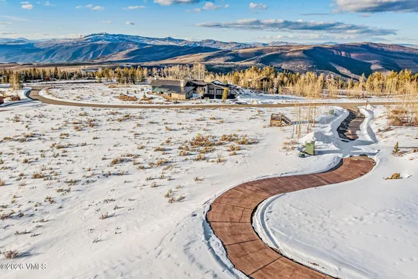 a view of swimming pool and outdoor seating