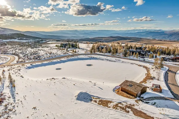an aerial view of beach and ocean
