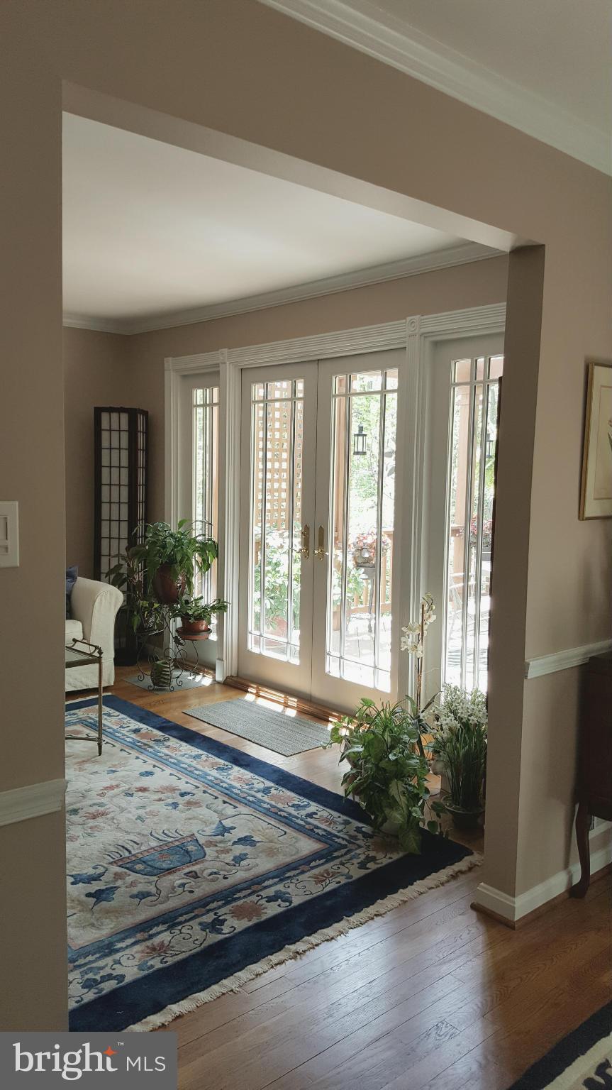 2360 Tumbletree Way Reston, VA 20191 - Photo 1 of 15 a living room with furniture and wooden floor