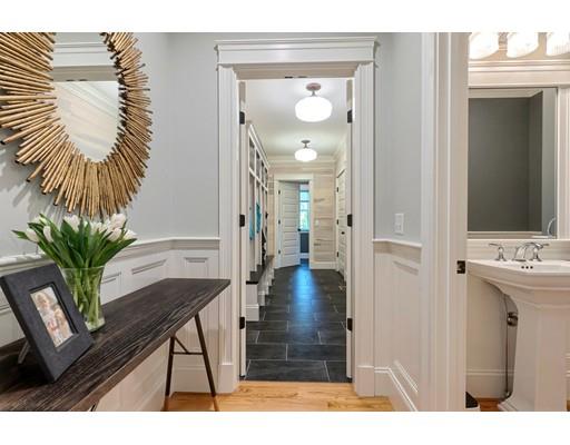 130 Ridge Road Concord, MA 01742 - Photo 11 of 26 a view of a hallway and dining room and wooden floor