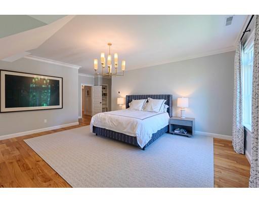 130 Ridge Road Concord, MA 01742 - Photo 12 of 26 a bedroom with a bed and a flat screen tv