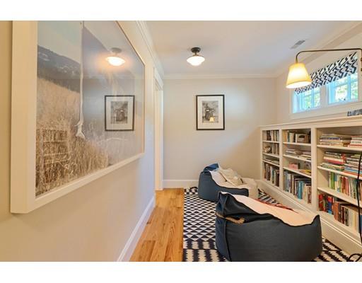 130 Ridge Road Concord, MA 01742 - Photo 18 of 26 a bedroom with a bed and a book shelf