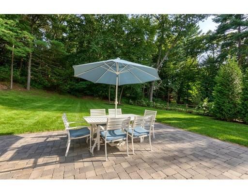130 Ridge Road Concord, MA 01742 - Photo 23 of 26 a view of backyard with seating and green space