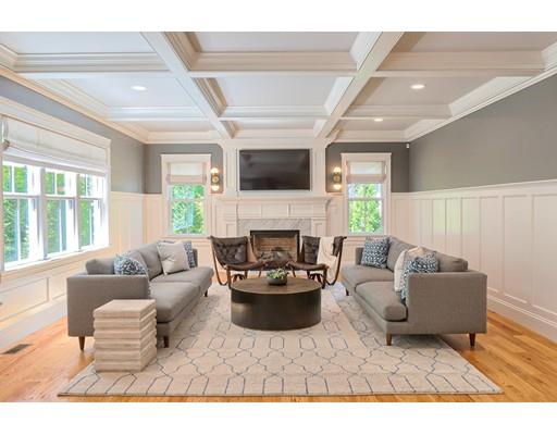 130 Ridge Road Concord, MA 01742 - Photo 3 of 26 a living room with furniture a flat screen tv and a fireplace