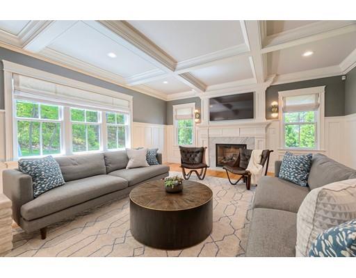 130 Ridge Road Concord, MA 01742 - Photo 6 of 26 a living room with furniture a fireplace and a large window