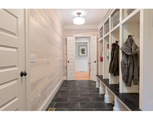 130 Ridge Road Concord, MA 01742 - Photo 10 of 26 a hallway with two black and white doors