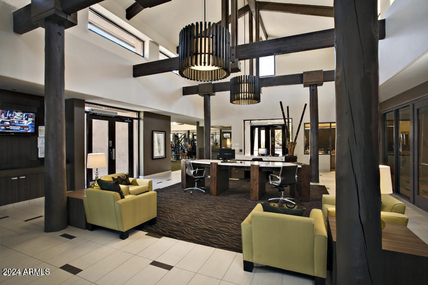 6135 East Evening Glow Drive Scottsdale, AZ 85266 - Photo 108 of 118 a living room with furniture and a flat screen tv