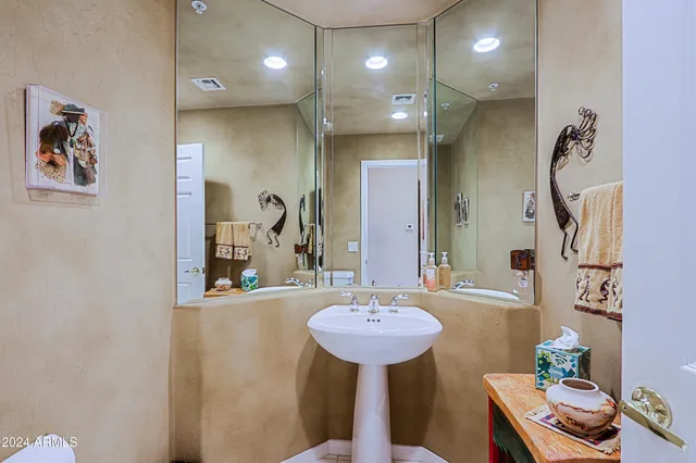 a view of a chairs and table in patio