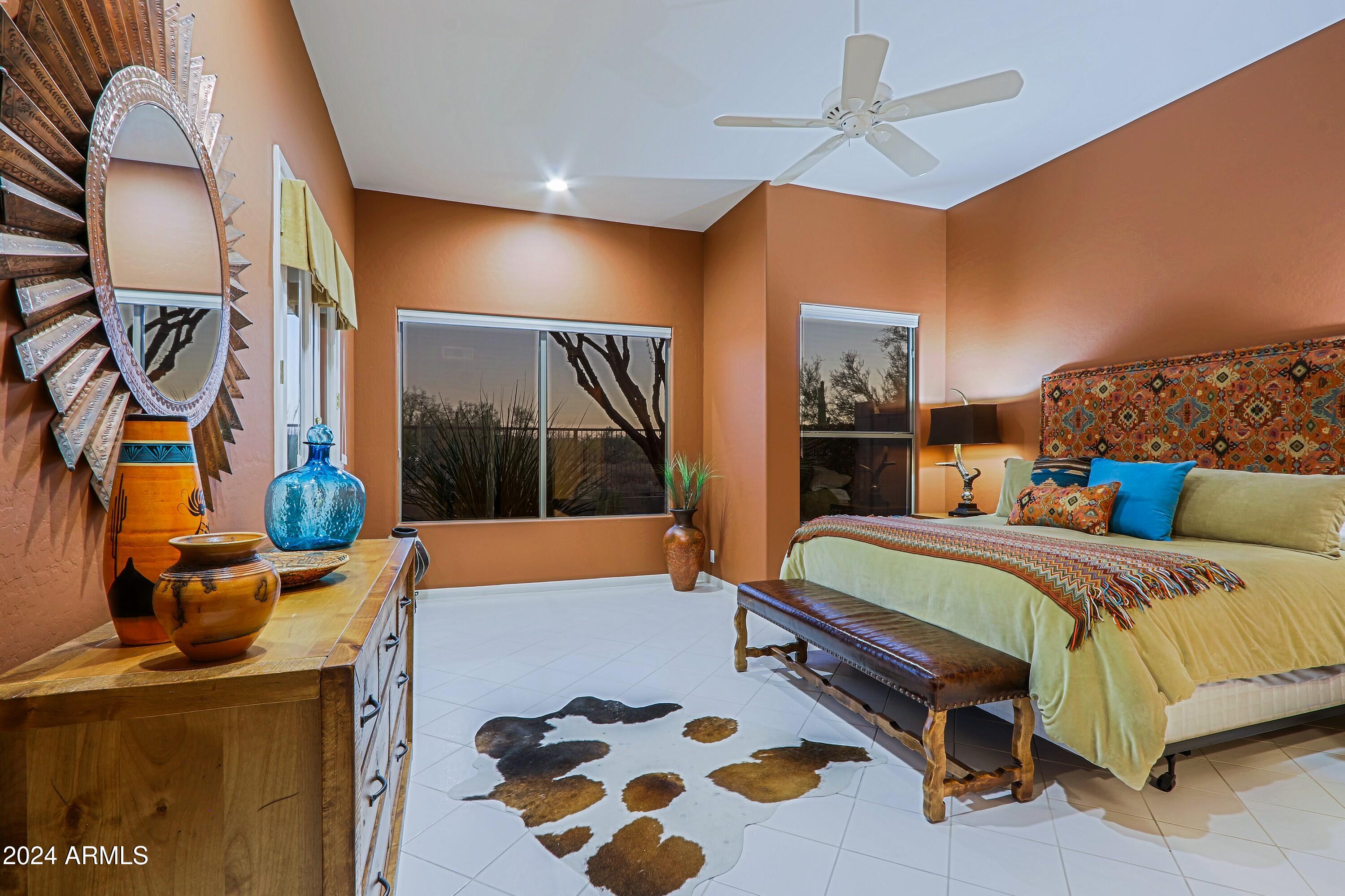 6135 East Evening Glow Drive Scottsdale, AZ 85266 - Photo 35 of 118 a bedroom with a bed and window