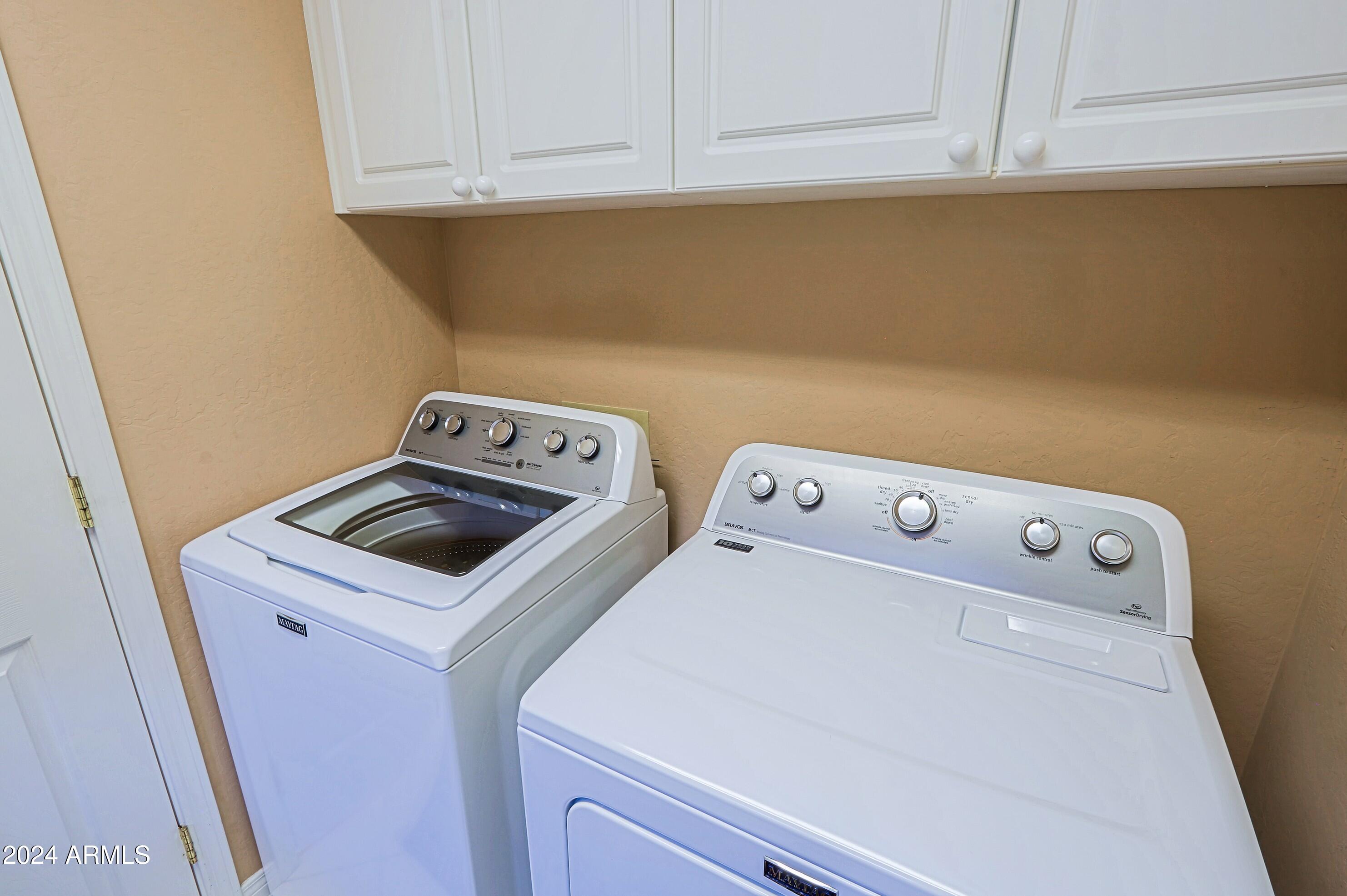 6135 East Evening Glow Drive Scottsdale, AZ 85266 - Photo 52 of 118 a utility room with dryer and washer