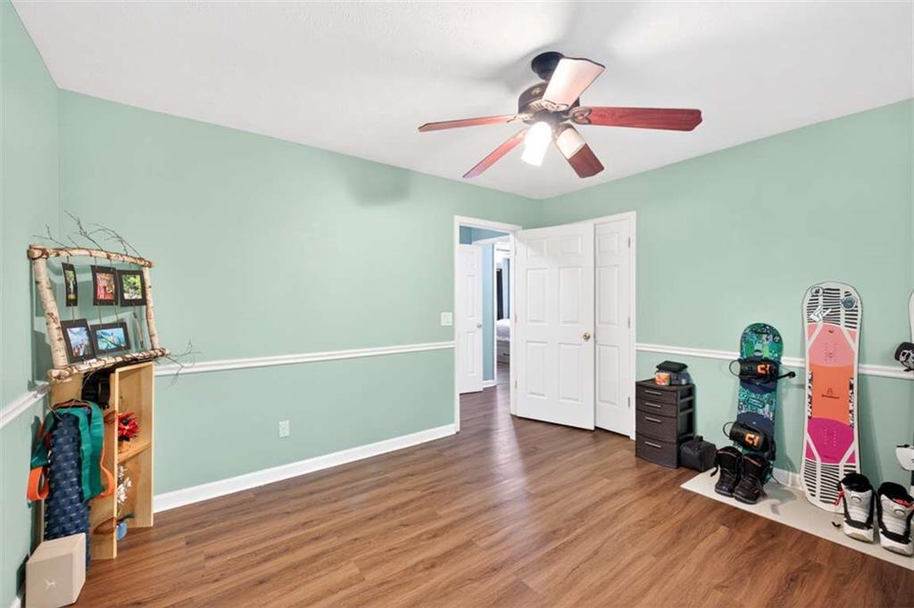 386 Ridgewood Drive Pendergrass, GA 30567 - Photo 19 of 50 a view of room with toys and wooden floor