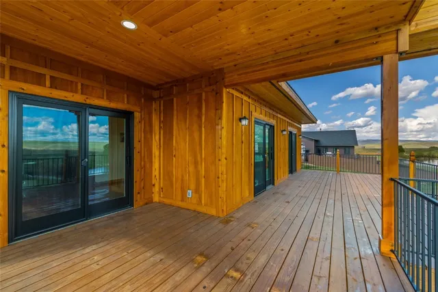 a view of gallery with wooden floor