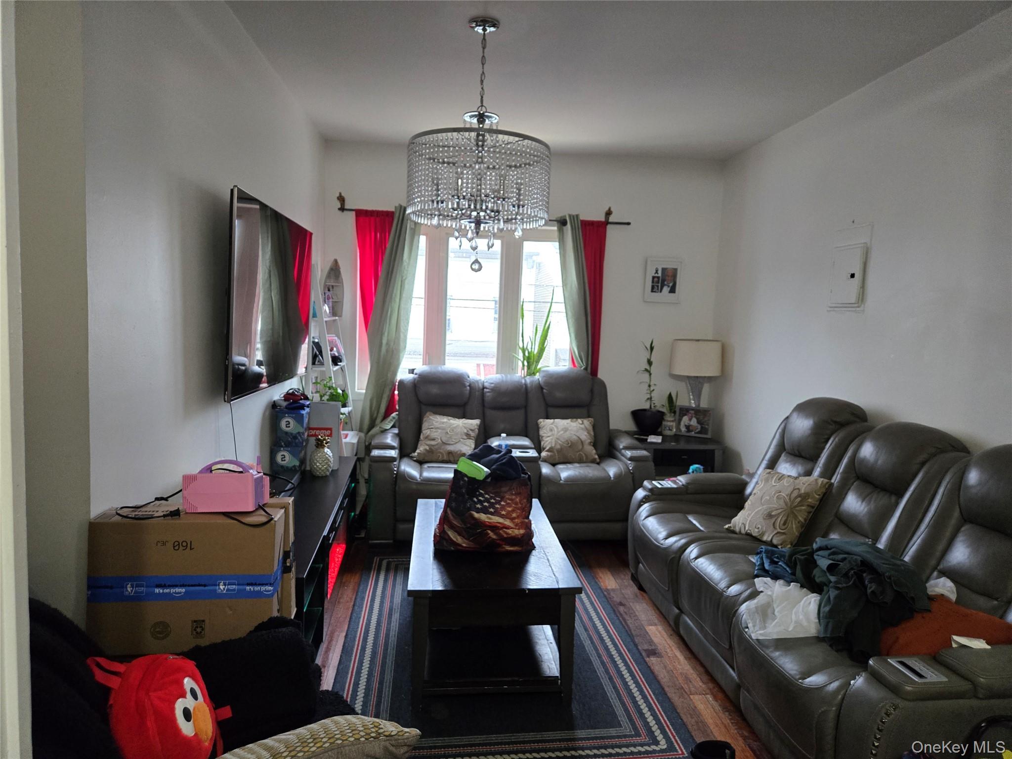 88-30 75th Street Queens, NY 11421 - Photo 13 of 23 a room with furniture a window and gym equipment