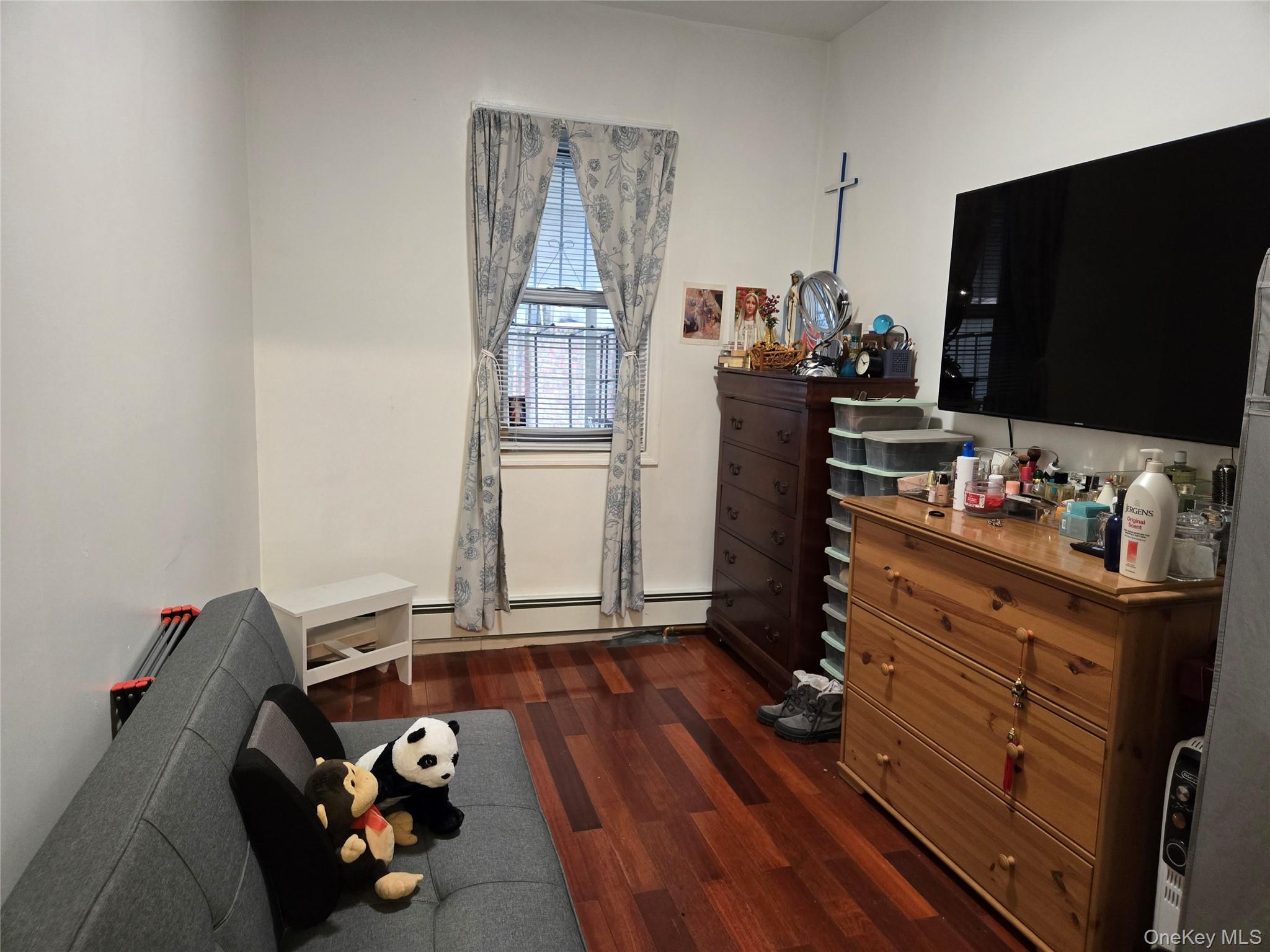 88-30 75th Street Queens, NY 11421 - Photo 10 of 23 a room with storage and utility
