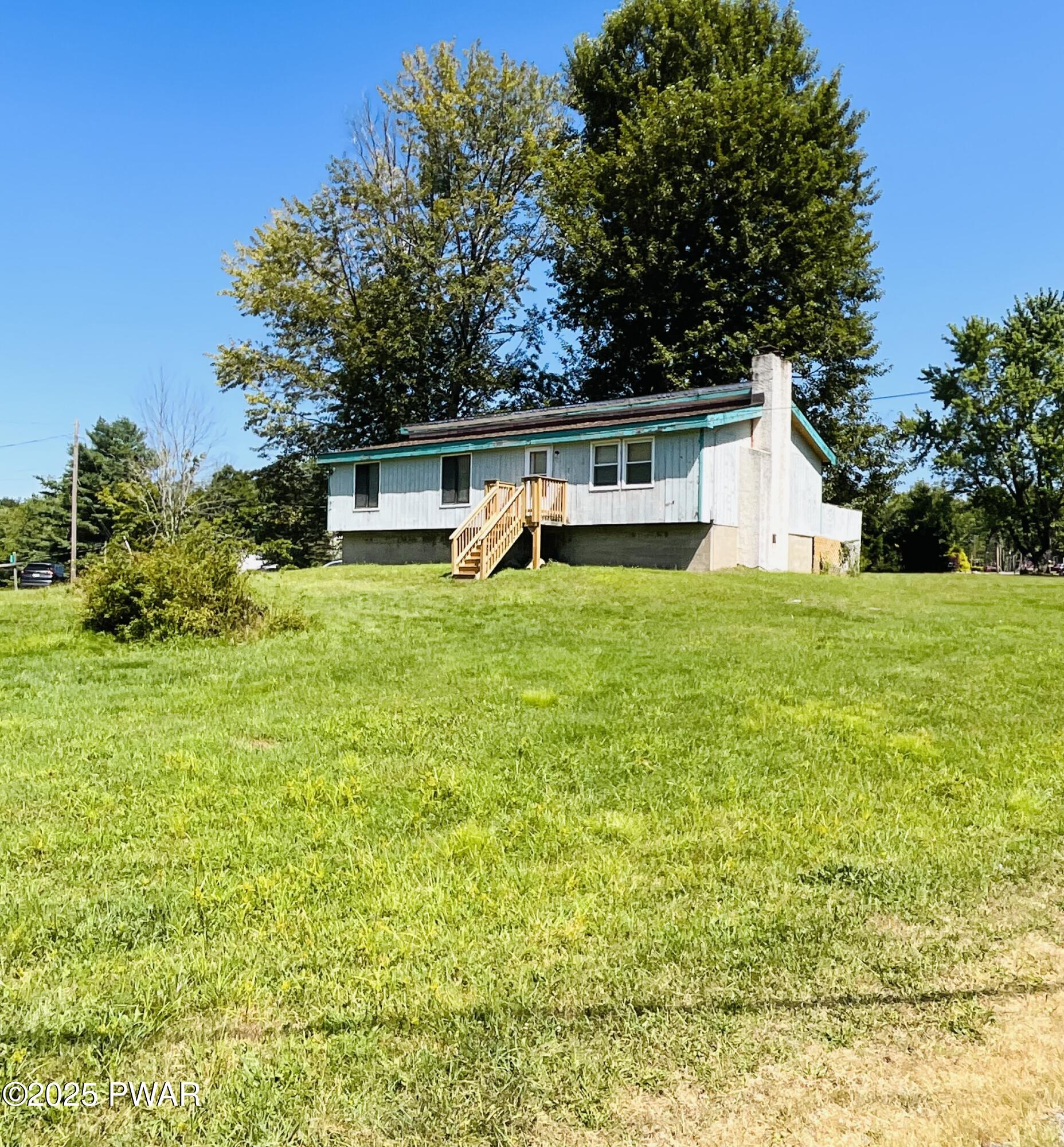 30 Brookfield Road, Unit LOT 1259 Lake Ariel, PA 18436 - Photo 2 of 32 a view of a house with a yard