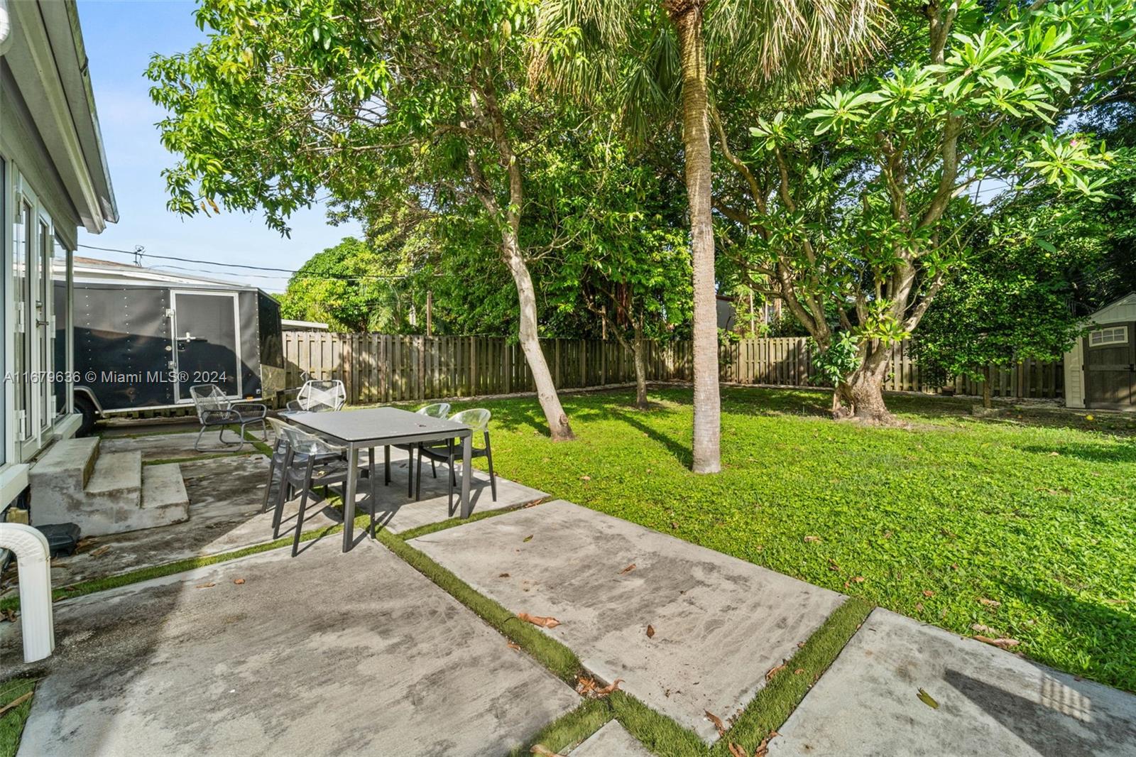 1757 Southwest 24th Terrace Miami, FL 33145 - Photo 20 of 26 a view of a bench in a garden