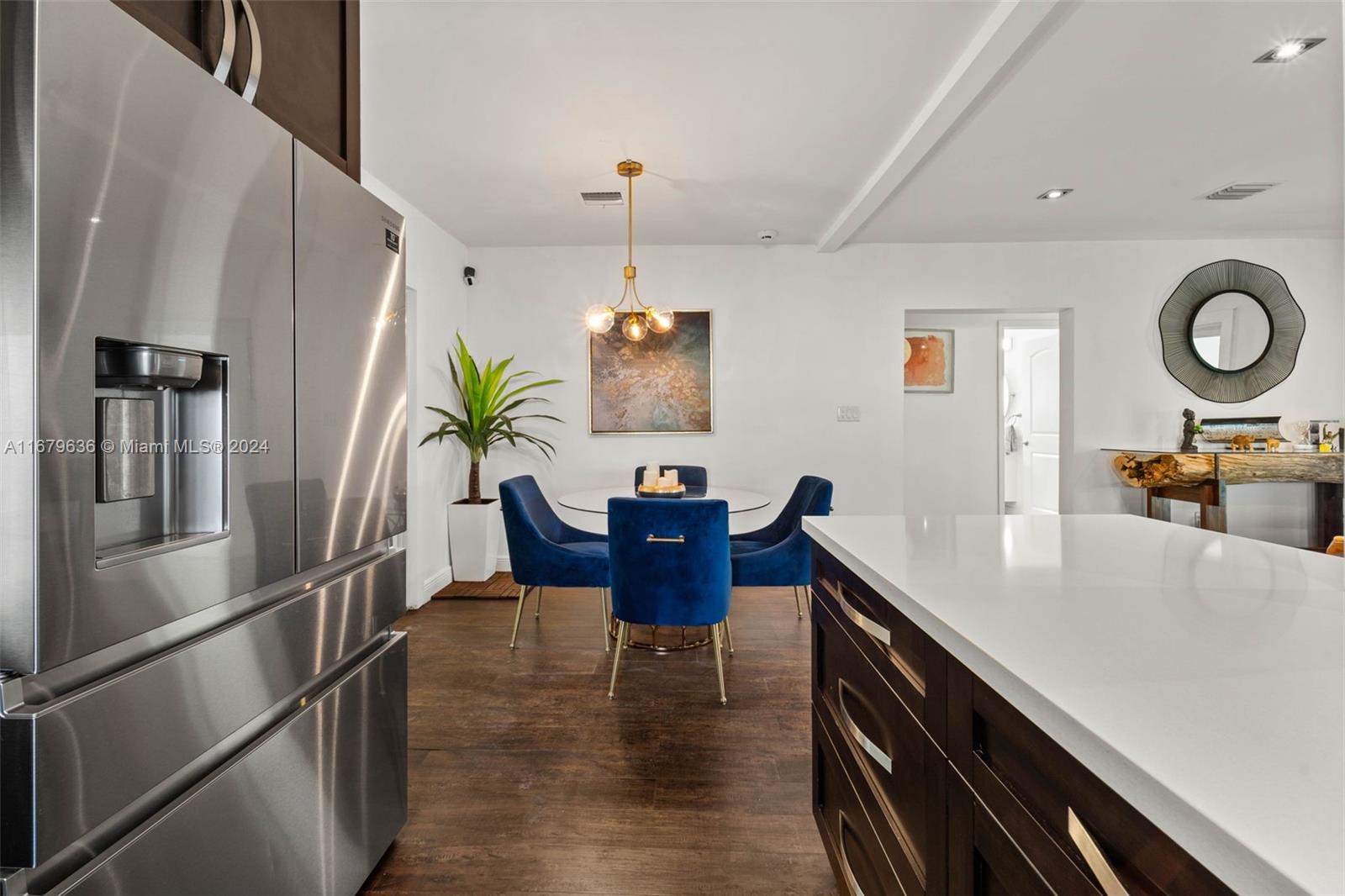 1757 Southwest 24th Terrace Miami, FL 33145 - Photo 8 of 26 a dining room with furniture and wooden floor