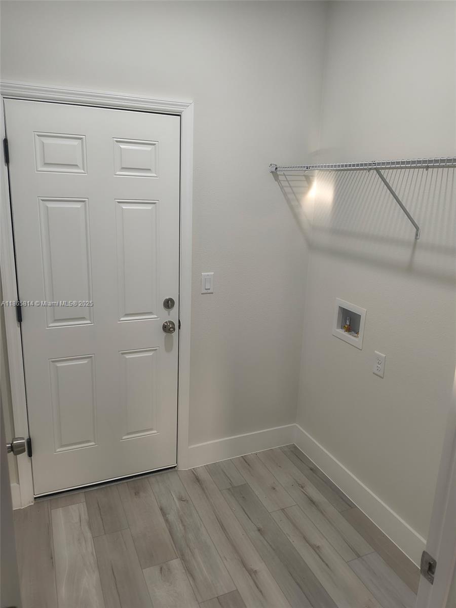 16745 Southwest 29th Terrace Ocala, FL 34473 - Photo 11 of 21 an empty room with wooden floor