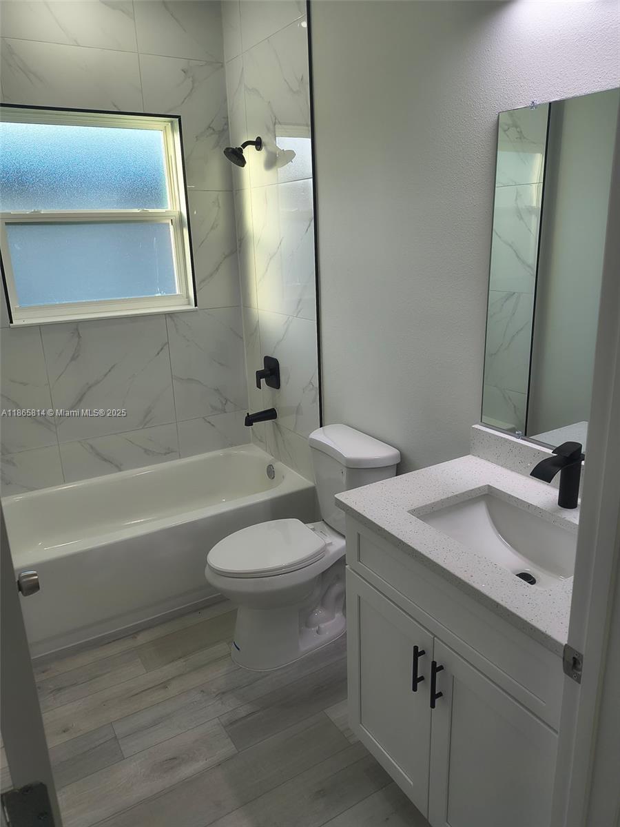 16745 Southwest 29th Terrace Ocala, FL 34473 - Photo 16 of 21 a bathroom with a sink and a mirror