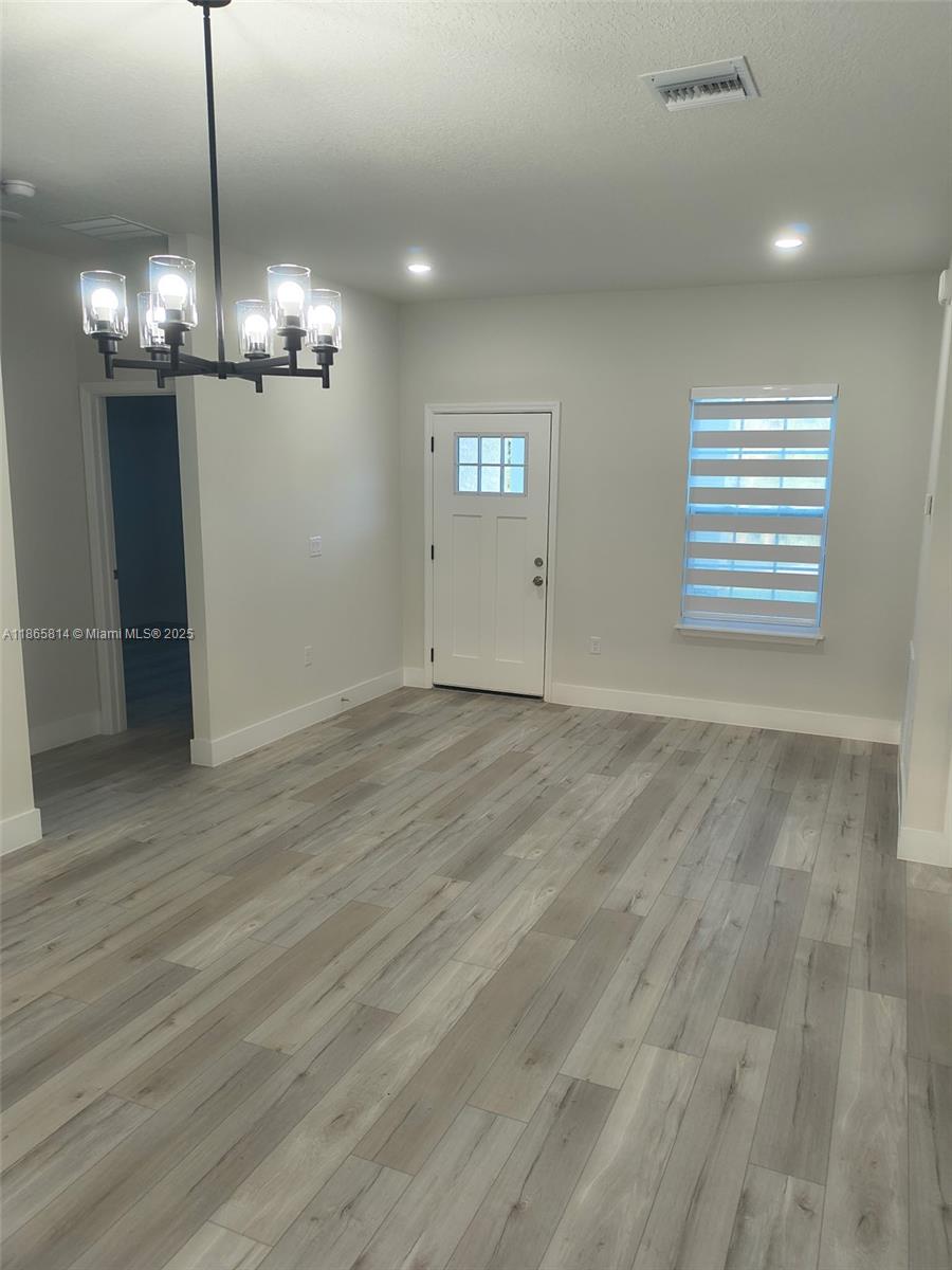 16745 Southwest 29th Terrace Ocala, FL 34473 - Photo 2 of 21 a view of a chandelier in a room