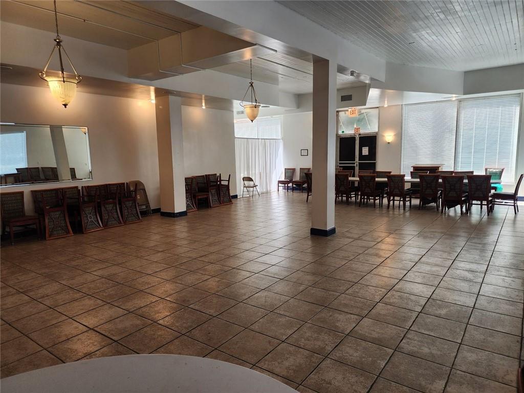 6958 Main Street Lithonia, GA 30058 - Photo 14 of 55 a lobby with furniture and dining table