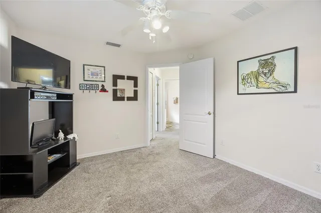 a view of a livingroom with a flat screen tv
