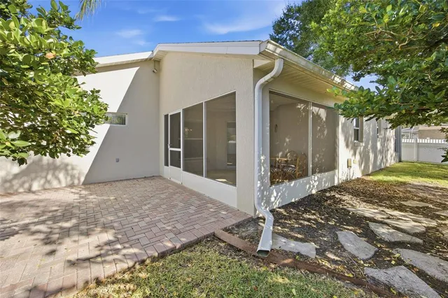 a view of a house with a tree