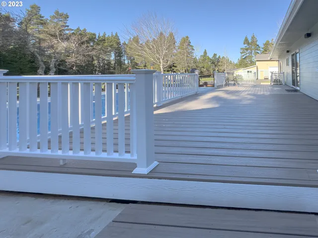 a view of livingroom with yard and staircase
