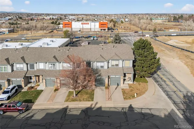a front view of a house with garage