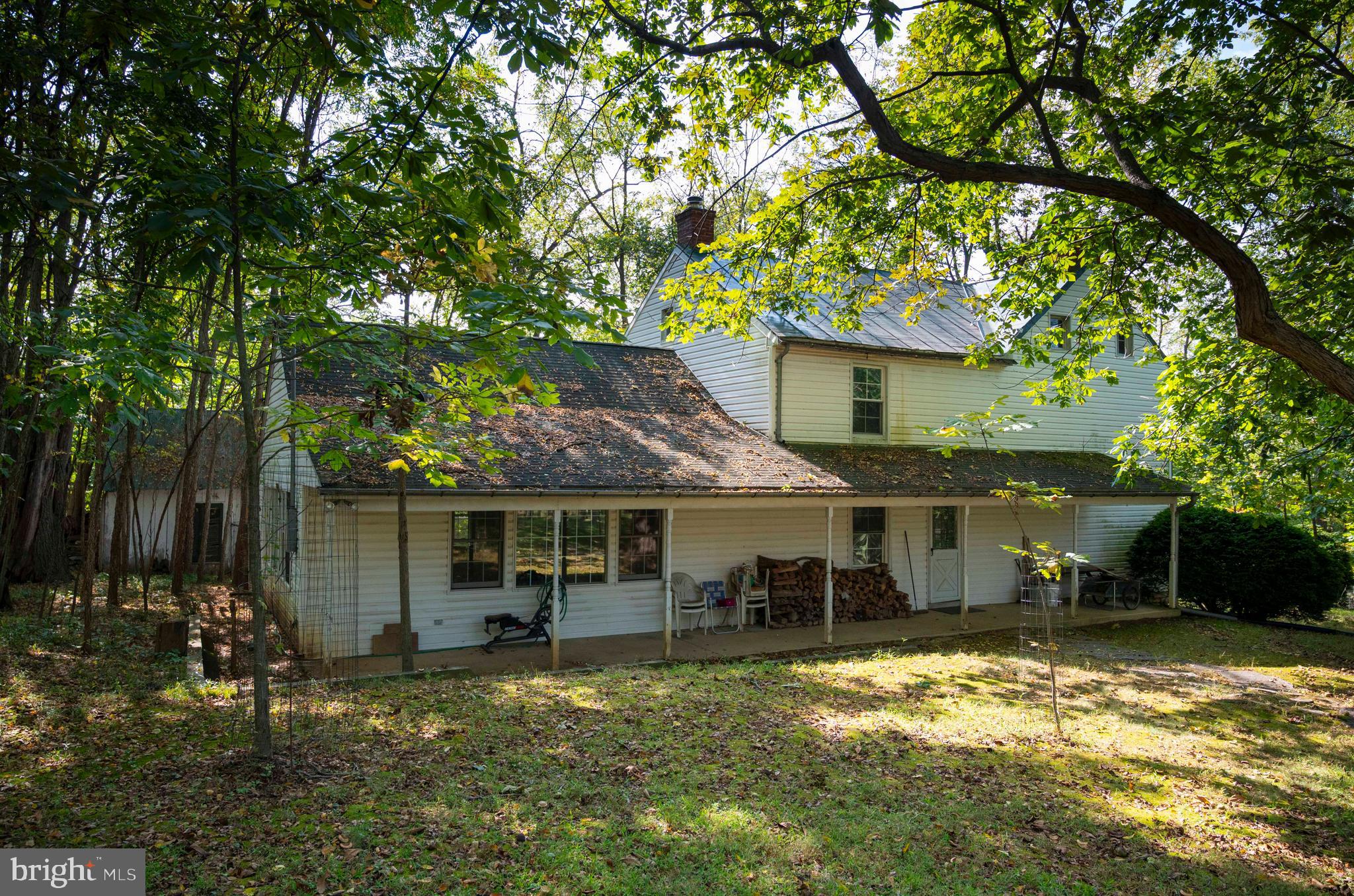 364 Knott Road Shepherdstown, WV 25443 - Photo 38 of 66 a front view of a house with a garden