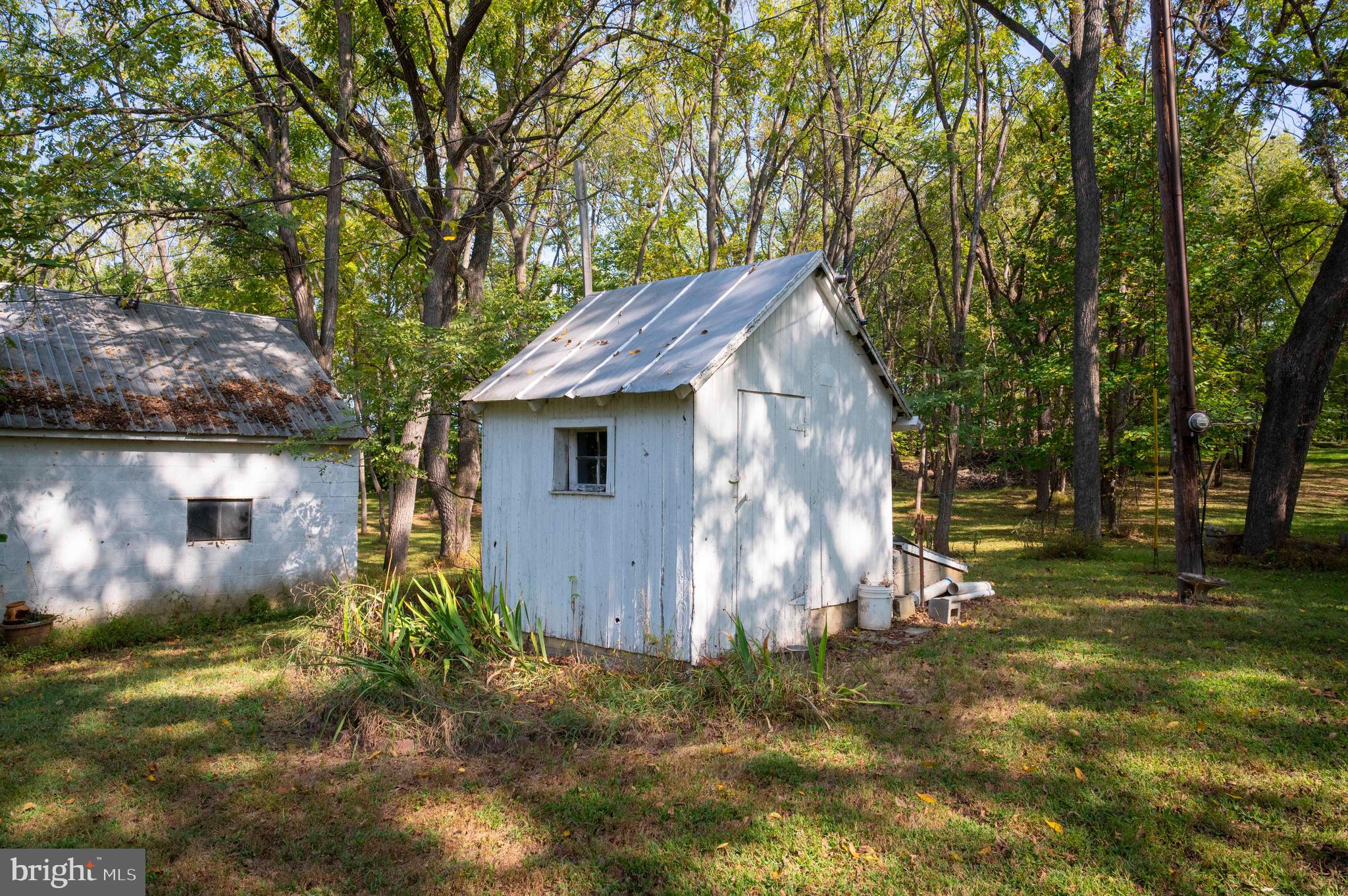 364 Knott Road Shepherdstown, WV 25443 - Photo 43 of 66 a backyard of a house with lots of green space