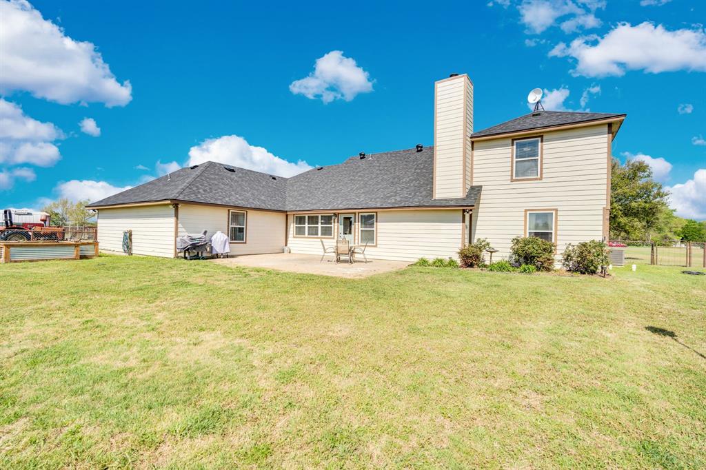 130 Eubanks Road Maypearl, TX 76064 - Photo 25 of 39 a front view of a house with swimming pool
