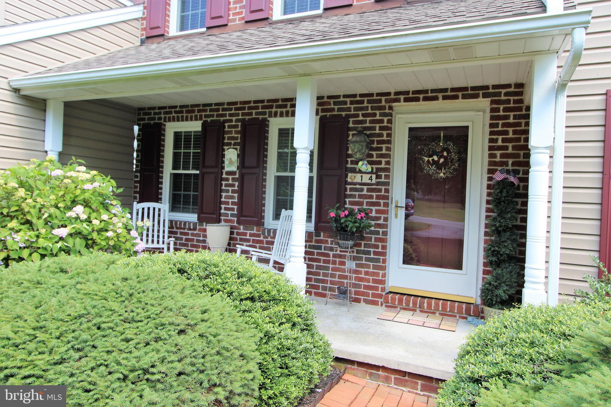 14 Countryside Lane Lititz, PA 17543 - Photo 14 of 41 a front view of a building with garden