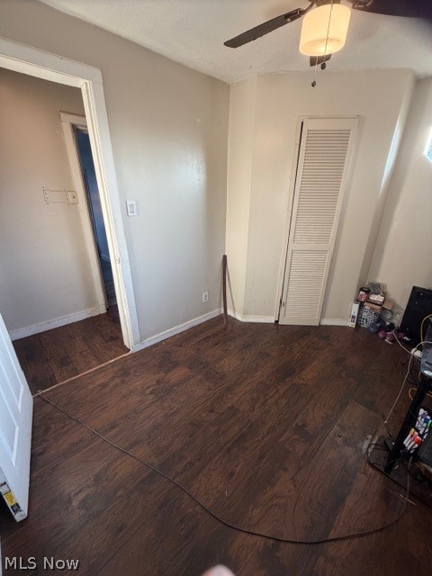 1148 Riverside Avenue Wellsville, OH 43968 - Photo 9 of 14 Bedroom with a closet, dark wood-type flooring, and a ceiling fan