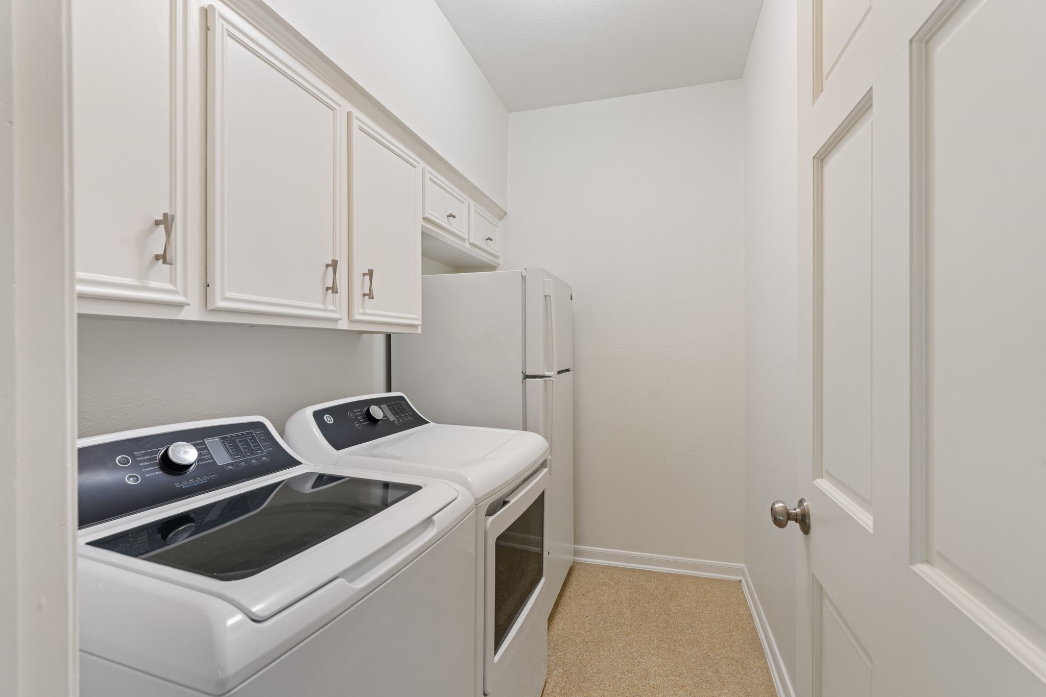 7416 Kelving Street Houston, TX 77030 - Photo 20 of 35 a view of storage and utility room with washer and dryer