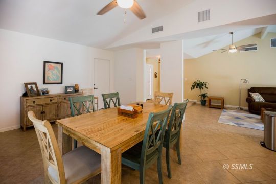 737 Peg Street Ridgecrest, CA 93555 - Photo 19 of 43 a view of a dining room with furniture