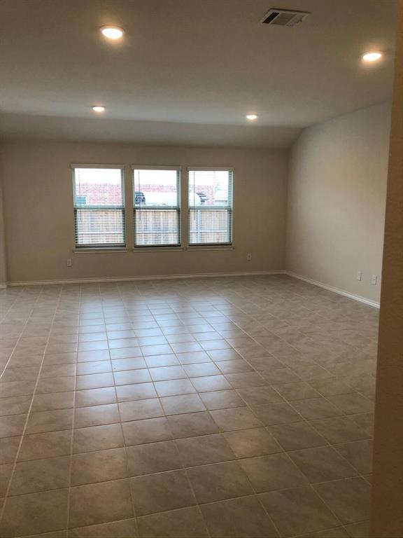 604 Rustic Meadows Trail Princeton, TX 75407 - Photo 2 of 15 a view of an empty room with a window
