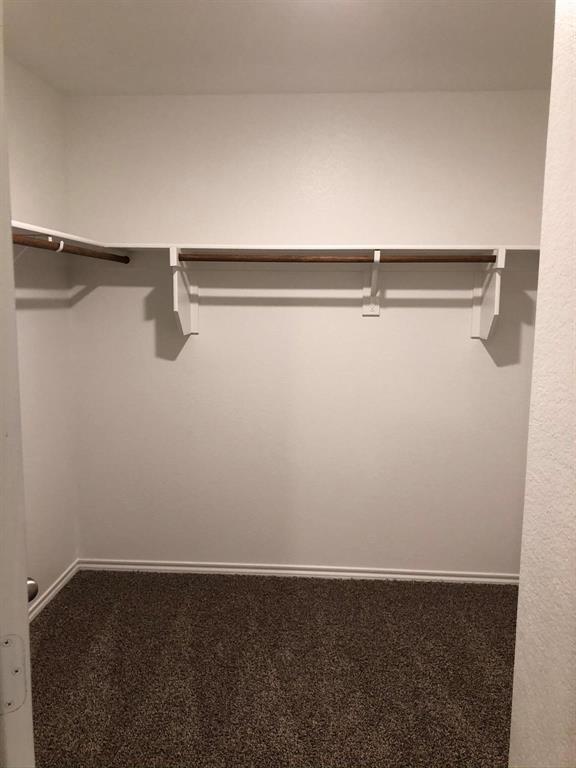 604 Rustic Meadows Trail Princeton, TX 75407 - Photo 5 of 15 a view of small space with racks on the wall