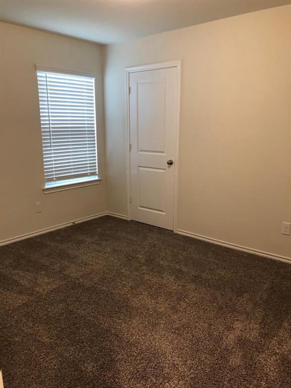 604 Rustic Meadows Trail Princeton, TX 75407 - Photo 7 of 15 an empty room with a window