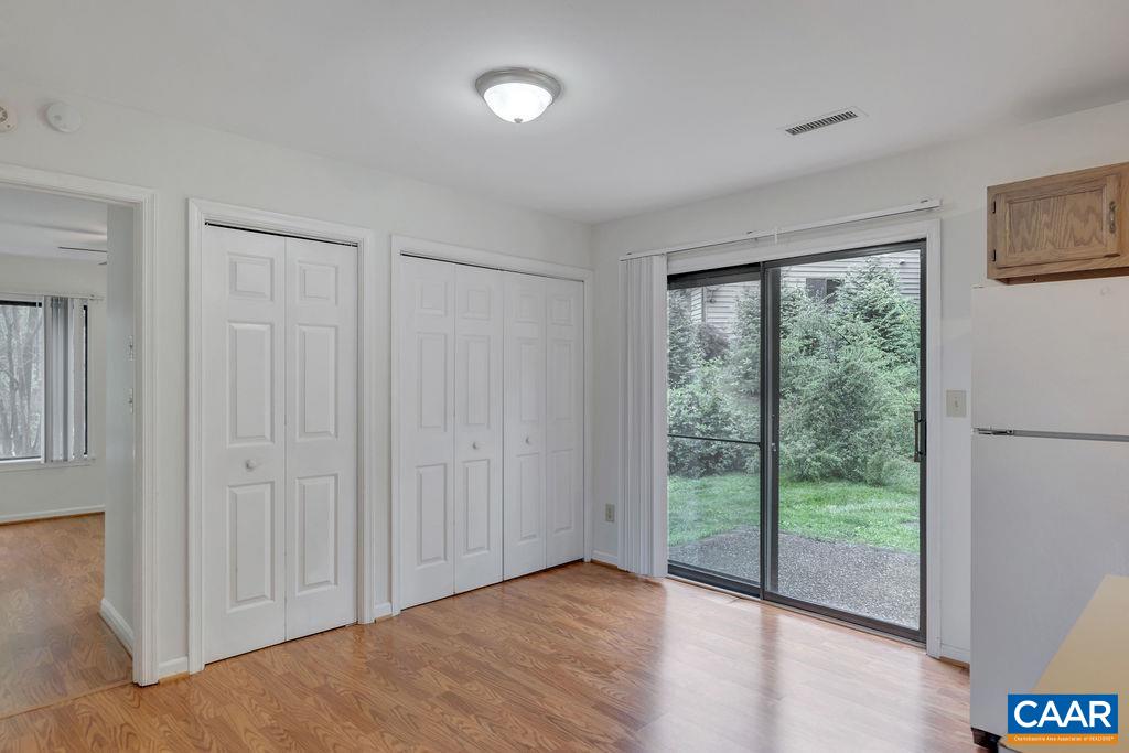 23 Ridgeview Circle Charlottesville, VA 22902 - Photo 15 of 27 a view of an empty room with wooden floor and a window