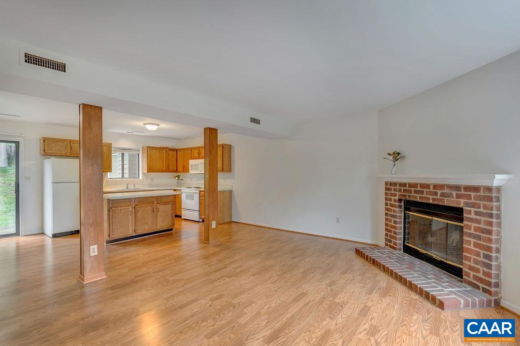23 Ridgeview Circle Charlottesville, VA 22902 - Photo 6 of 27 a view of a kitchen with a stove cabinets and wooden floor