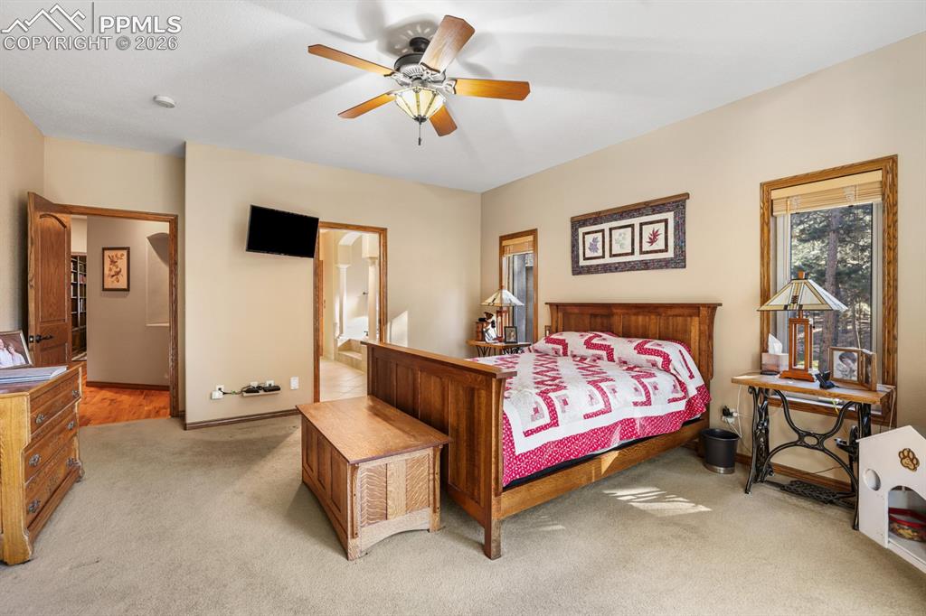 17990 Sawmill Road Colorado Springs, CO 80908 - Photo 5 of 40 Spacious primary bedroom suite